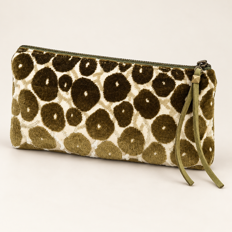 Angled view of Atenti Olive Cheetah Tall Tool Pouch, showing its textured spotted pattern and green zipper pull.