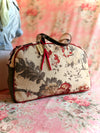 Camellia Overnighter – Handmade Floral Tapestry Weekender with Vegan Leather Sides & Red Trim