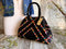 Indi Pop Divina, Handbag